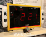A digital wall clock with built-in MP3 player and FM radio