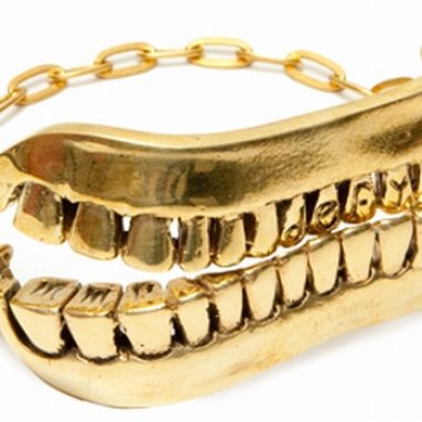 gold tooth smile bracelet