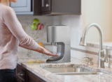 The Towel Eliminating Touchless Hand Dryer