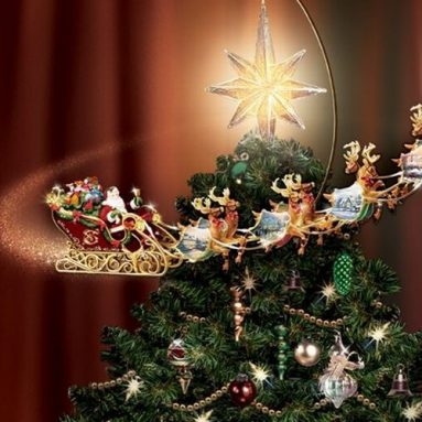 The Thomas Kinkade Revolving Christmas Tree Topper