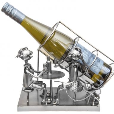 Couple Siting At the Table with Wine