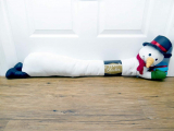 Jumbo Fleece Christmas Friends 36″ Long- Assorted Draft Stopper