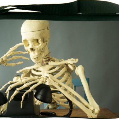 Rainbow Glow Skull Messenger Bag