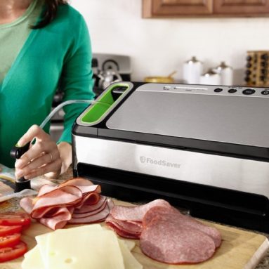 Vacuum Sealing System with Bonus Built-in Retractable Handheld Sealer