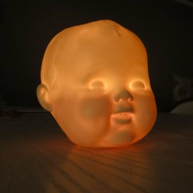 Baby-doll head tea-light
