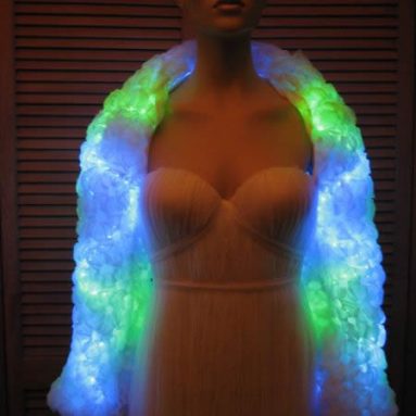 white dress with glowing sleeves