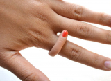 Finger Ring with Red Nail Polish
